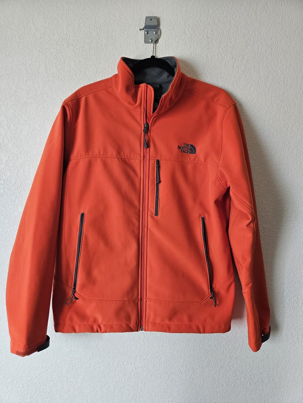 The North Face Men's Bright Orange Softshell Jacket